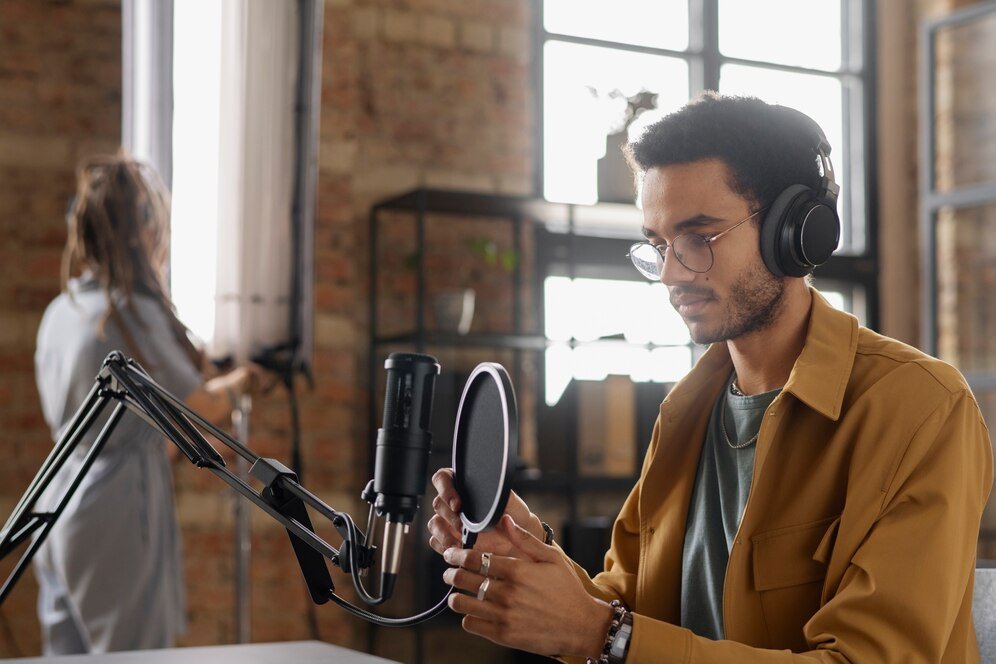 medium-shot-young-people-preparing-podcast_23-2149386530